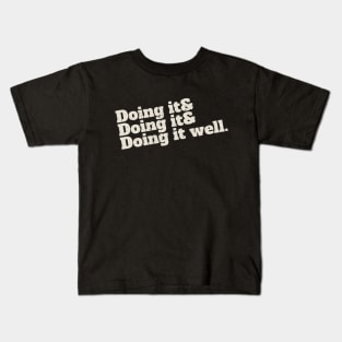 Doing it. Doing it. Doing it well. Kids T-Shirt